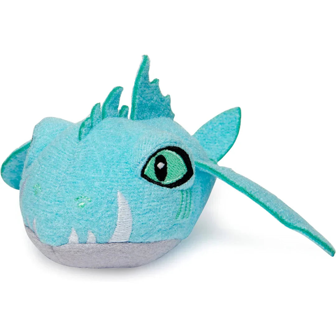 Plush toy dragon with teal color on a white background