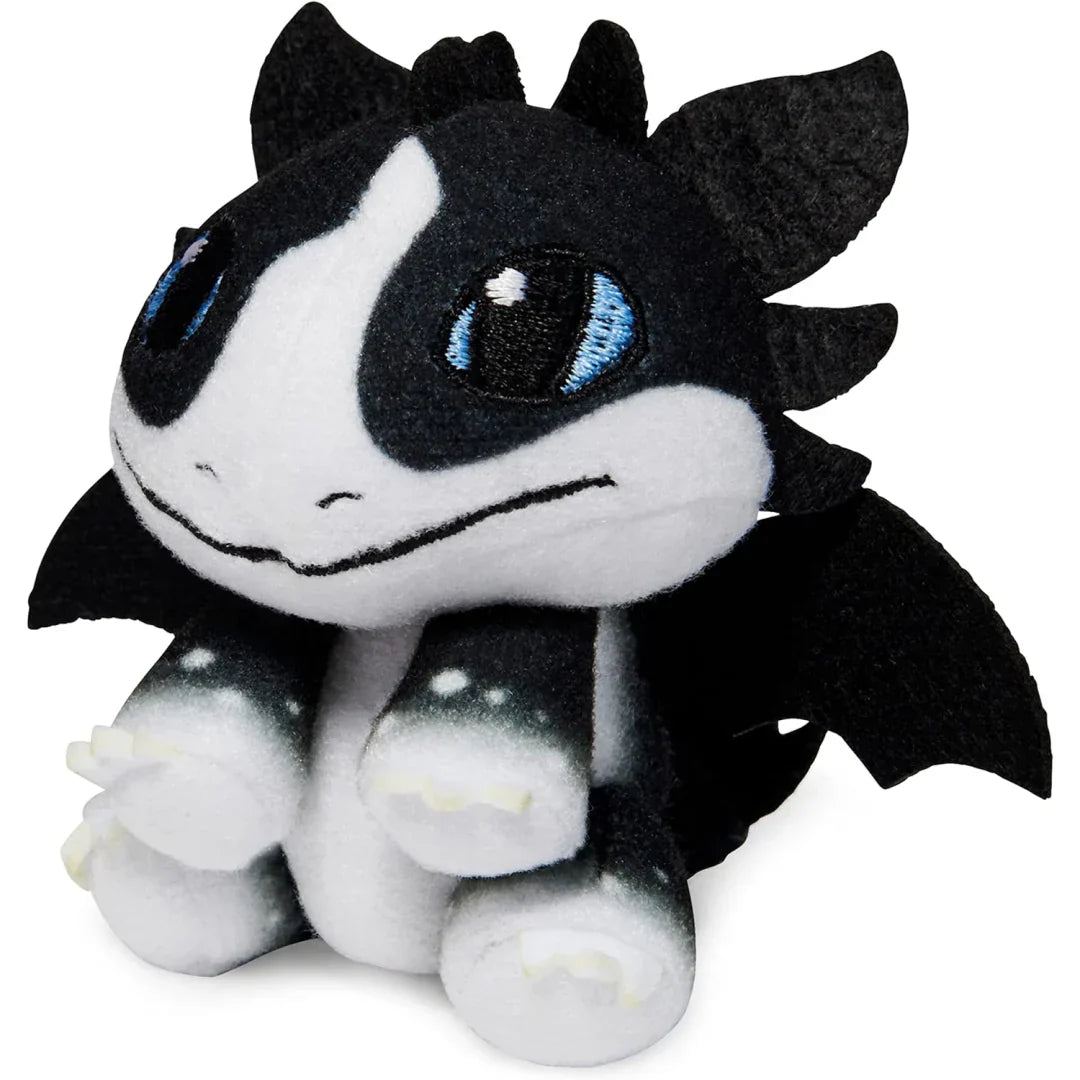 Plush toy with black and white design on a white background