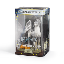 Boxed figurine of a magical creature Buckbeak from 'Harry Potter' series on a white background
