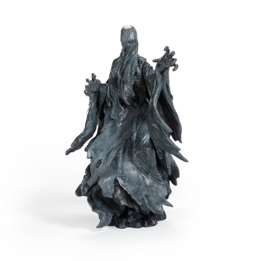 Dark gray statue of a hooded figure with outstretched arms on a white background