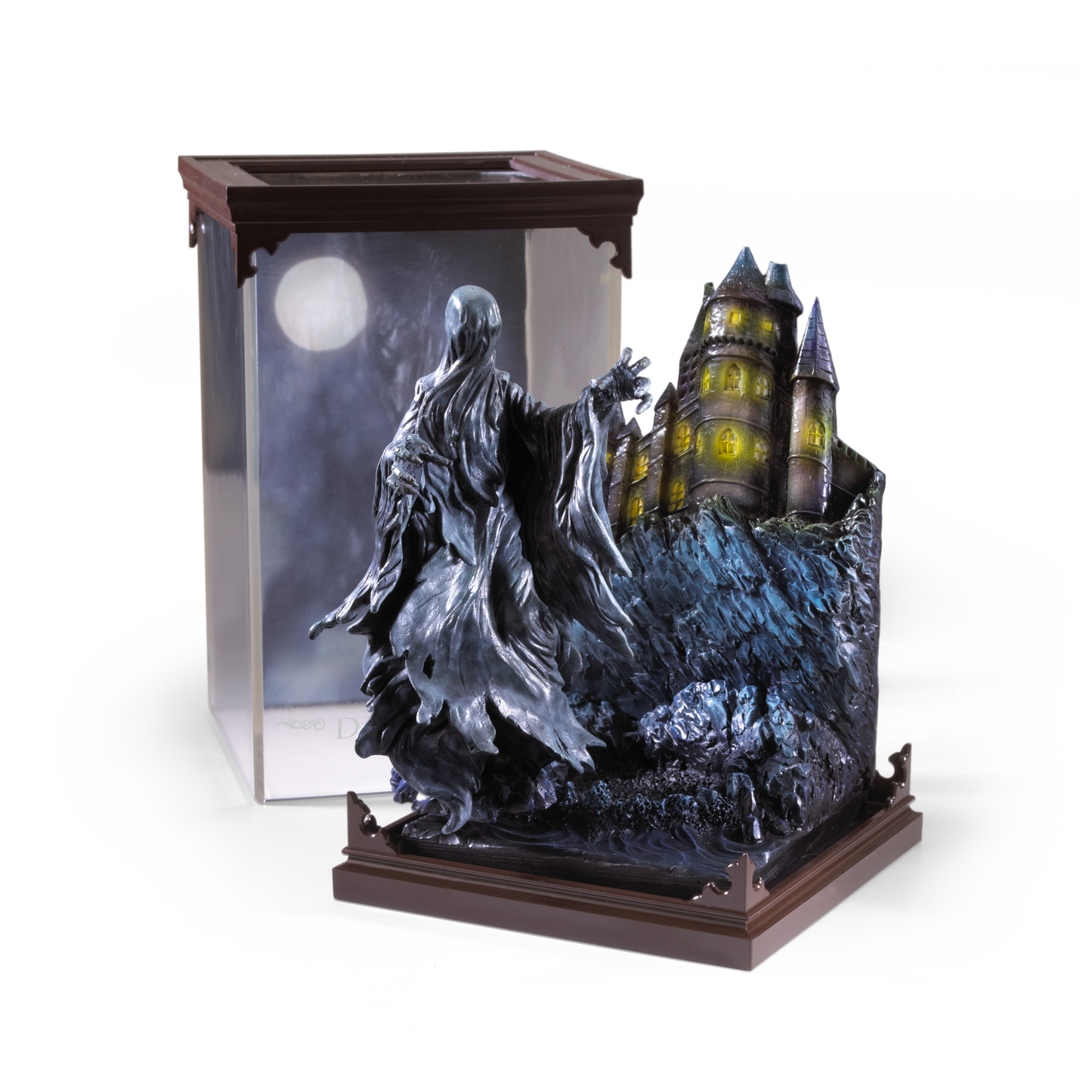 Statue of a Dementor figure with a castle in the background on a white background