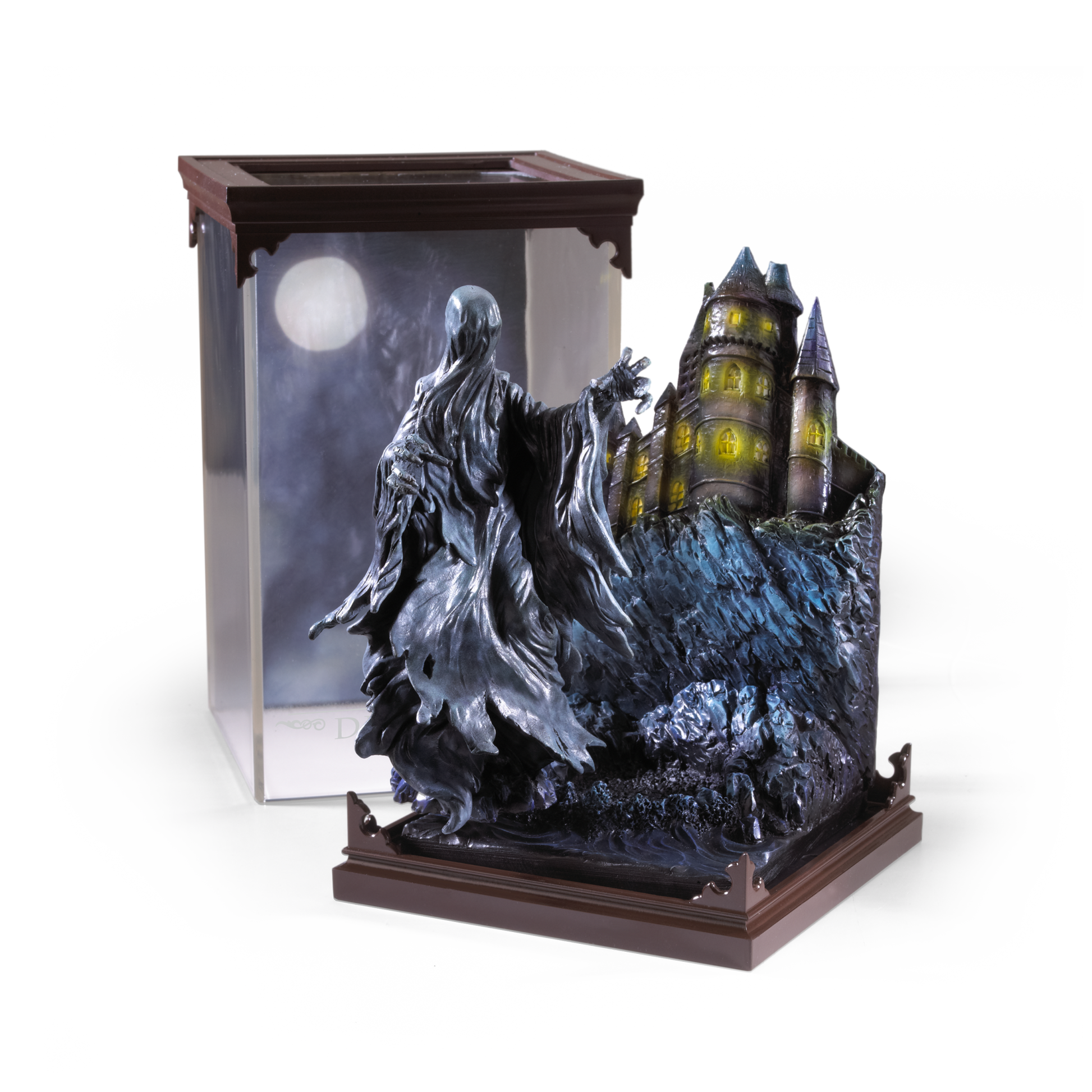 Statue of a Dementor figure with a castle in the background on a white background