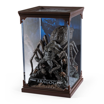 Spider figurine in a glass display case with 'Aragog' branding on a white background