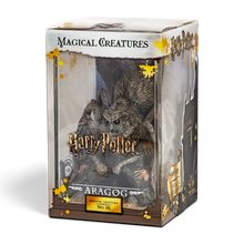 Boxed figurine of Aragog from Harry Potter series on a white background