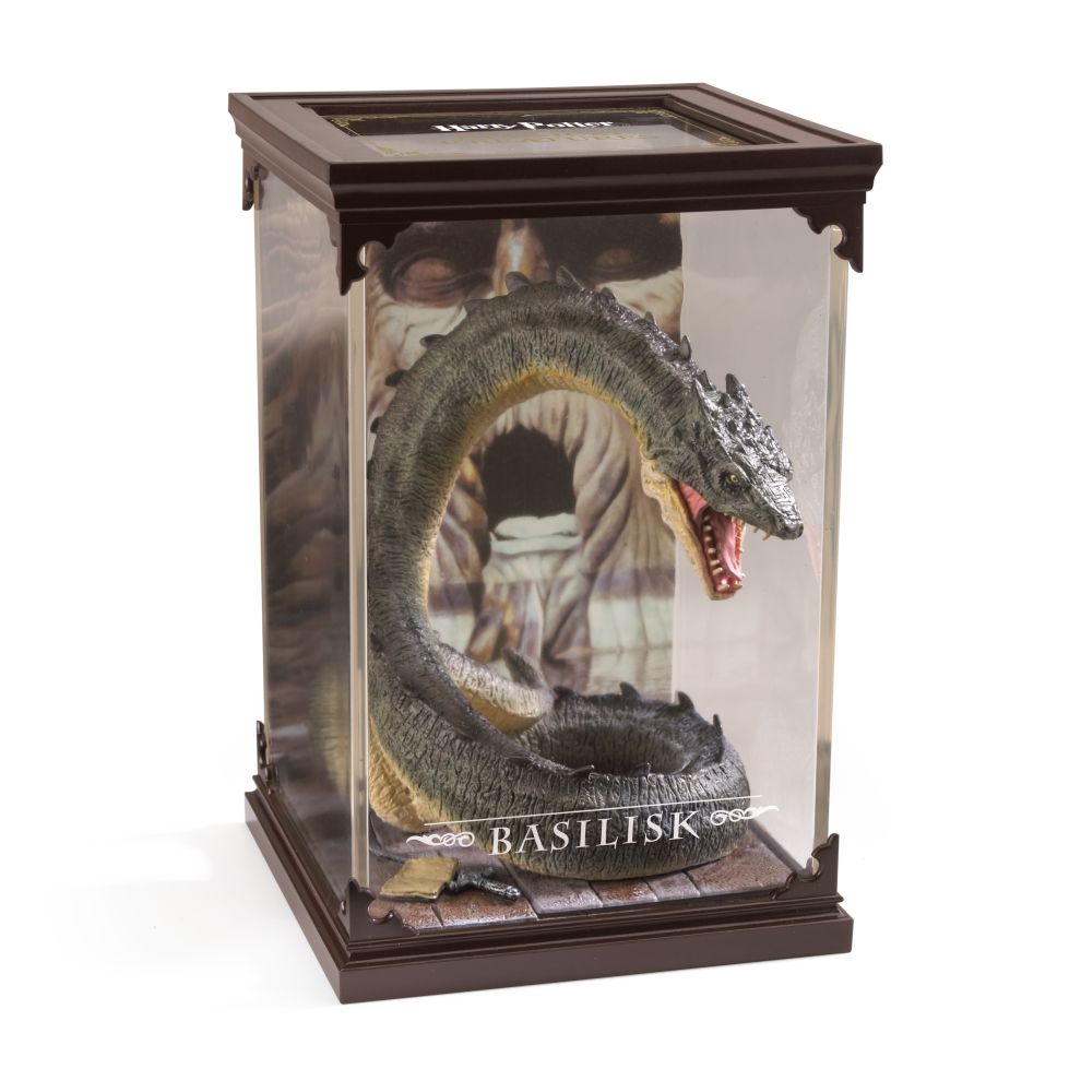 Model of a basilisk in a glass display case with 'Harry Potter' branding.