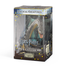 Boxed Basilisk figure from Harry Potter series on a white background