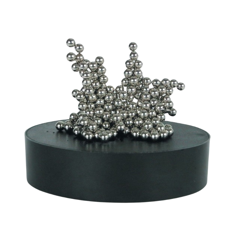 Metallic ball sculpture on a black base against a white background
