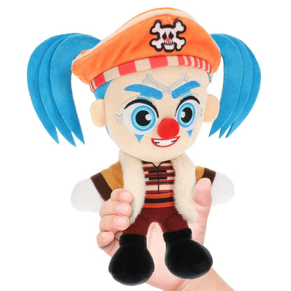 Plush toy with a clown-like design featuring blue hair, orange hat, and red nose on a white background