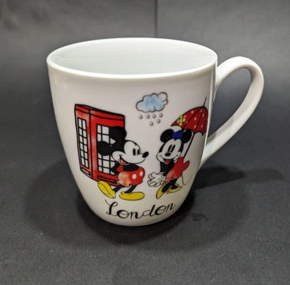 Official Disney large white mug featuring Minnie & Mickey with London design. Perfect gift idea for Disney fans. Shop now at New, Used and More!