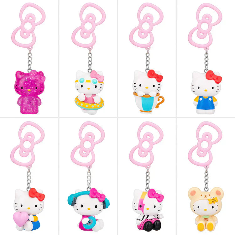Set of Hello Kitty keychains with different poses and outfits on a white background