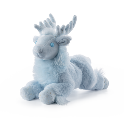 Plush toy reindeer with blue eyes on a white background