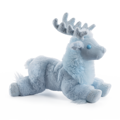 Plush reindeer toy on a white background