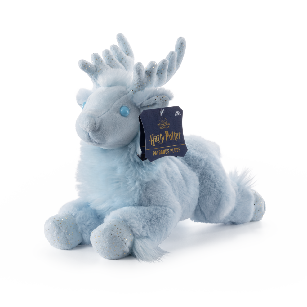 Plush toy resembling a creature with antlers and a Harry Potter tag on a white background