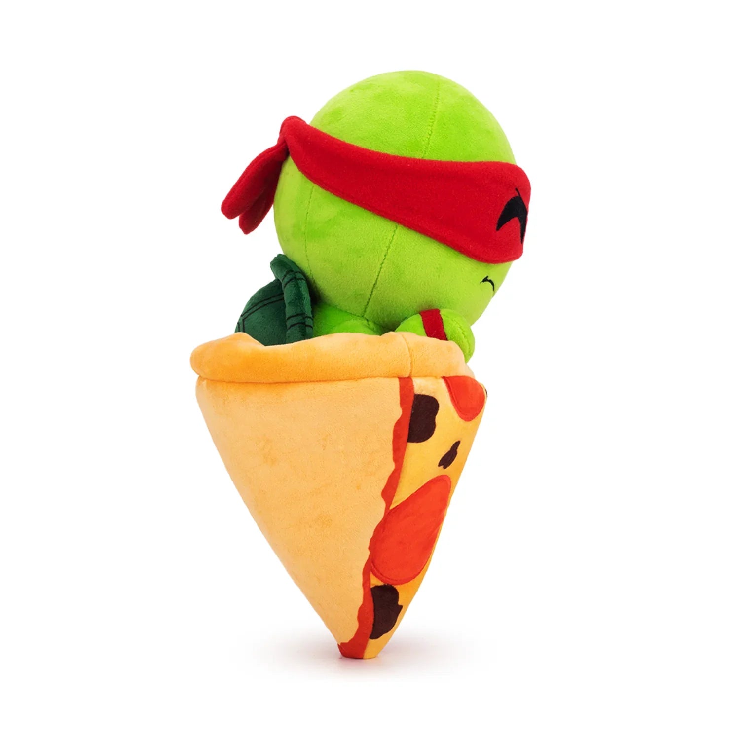 TMNT Plush toy resembling a character from a popular animated series, sitting inside a taco.