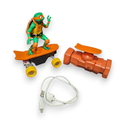 Pre-owned TMNT Mutant Mayhem Half Pipe RC Mikey in very good condition. Includes RC figure, controller & charger. Box damaged. Shop at New, Used and More!
