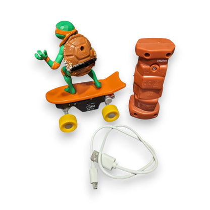 Pre-owned TMNT Mutant Mayhem Half Pipe RC Mikey in very good condition. Includes RC figure, controller & charger. Box damaged. Shop at New, Used and More!