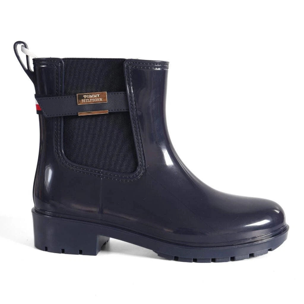 Tommy Hilfiger Women’s Flag Belt Rainboots in Space Blue. Waterproof, stylish & durable for any weather. Shop now at New, Used and More!