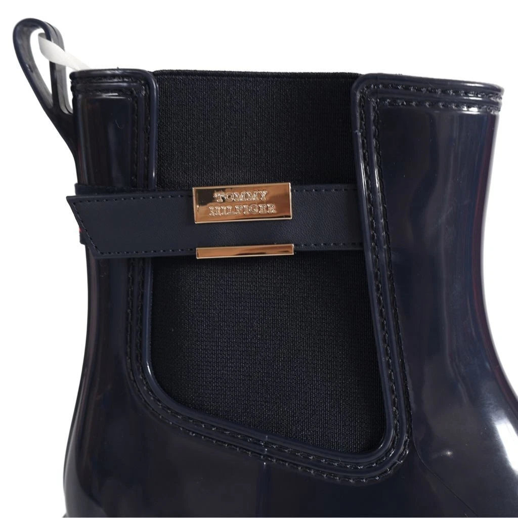 Tommy Hilfiger Women’s Flag Belt Rainboots in Space Blue. Waterproof, stylish & durable for any weather. Shop now at New, Used and More!