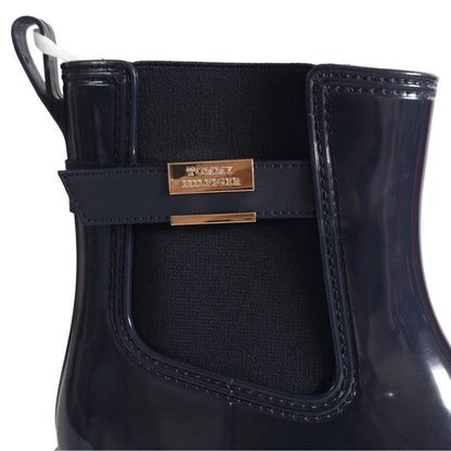 Tommy Hilfiger Women’s Flag Belt Rainboots in Space Blue. Waterproof, stylish & durable for any weather. Shop now at New, Used and More!
