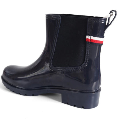 Tommy Hilfiger Women’s Flag Belt Rainboots in Space Blue. Waterproof, stylish & durable for any weather. Shop now at New, Used and More!
