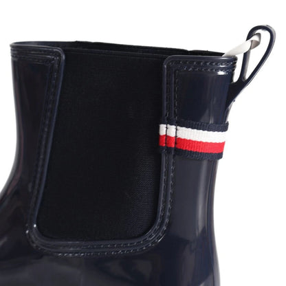Tommy Hilfiger Women’s Flag Belt Rainboots in Space Blue. Waterproof, stylish & durable for any weather. Shop now at New, Used and More!