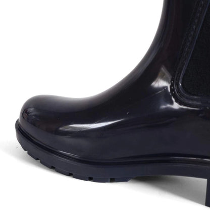 Tommy Hilfiger Women’s Flag Belt Rainboots in Space Blue. Waterproof, stylish & durable for any weather. Shop now at New, Used and More!