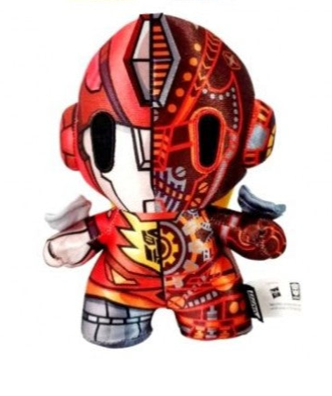 Colorful toy figure with red and black design on a white background