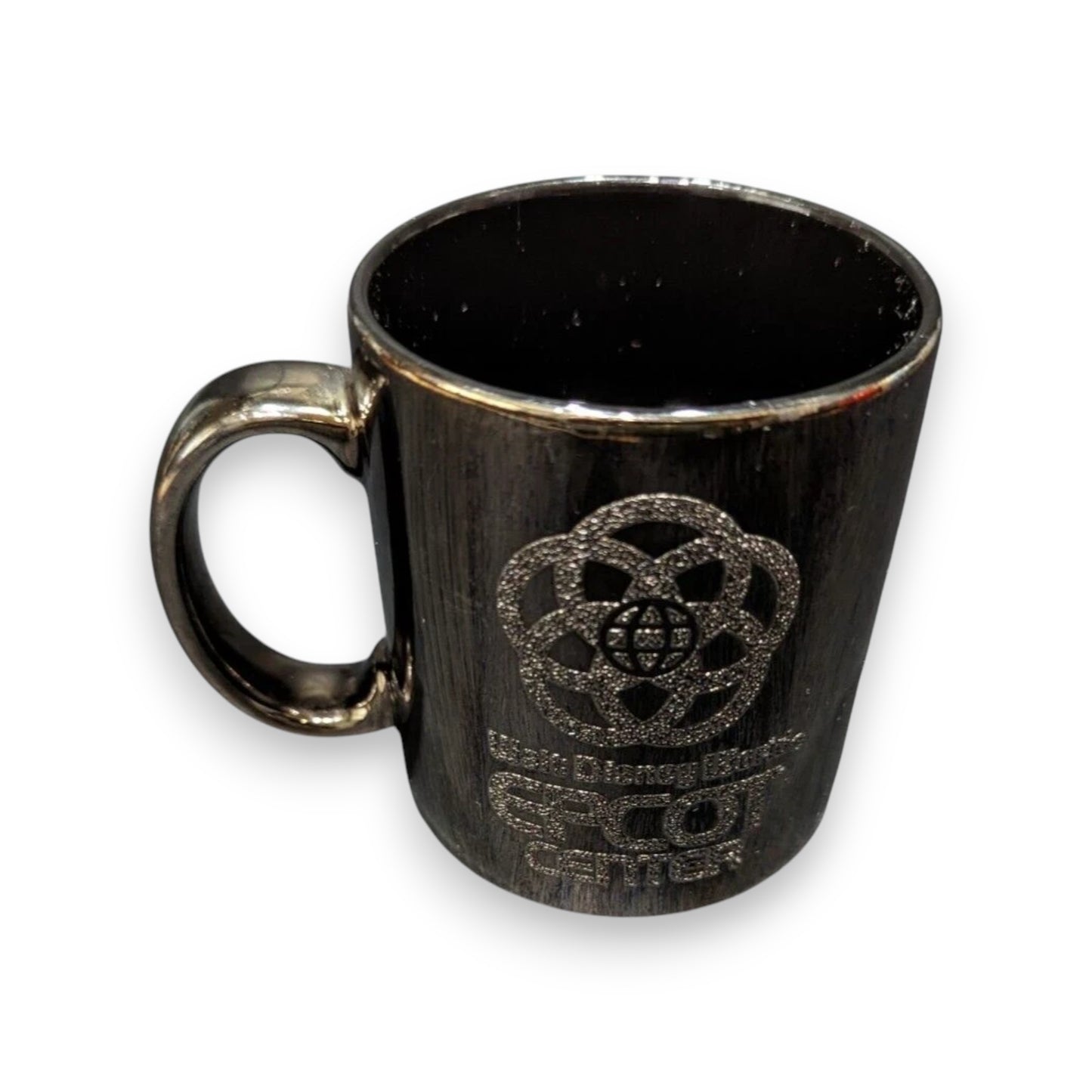 Rare 1980s Walt Disney World Epcot Center smoked chrome mug. Vintage collectible for Disney fans and coffee lovers. Shop now at New, Used and More!