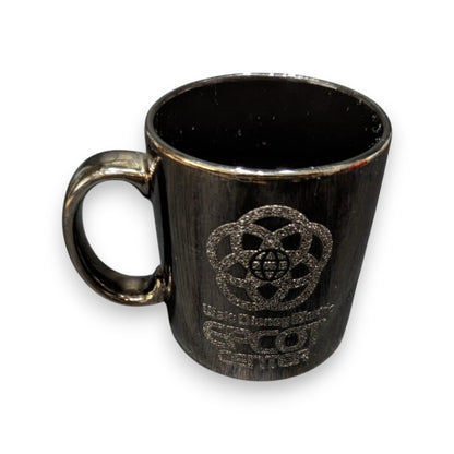 Rare 1980s Walt Disney World Epcot Center smoked chrome mug. Vintage collectible for Disney fans and coffee lovers. Shop now at New, Used and More!