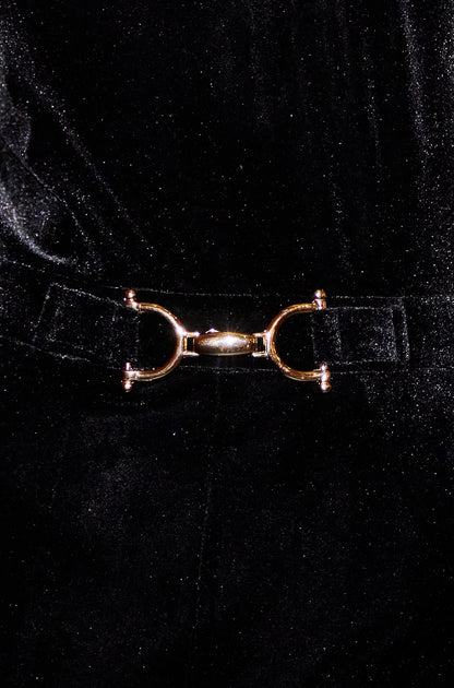 Black Velvet Jumpsuit With Twist Neckline And Buckle Belt