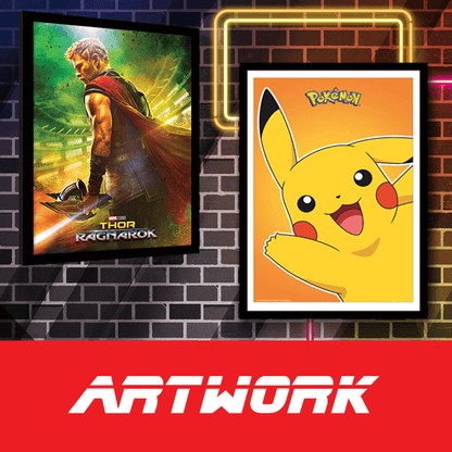 Two framed posters, one of Thor and the other of Pikachu, on a brick wall with 'Artwork' branding.