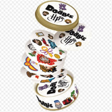 Stack of 'Dobble HP' card game boxes with visible branding on a white background