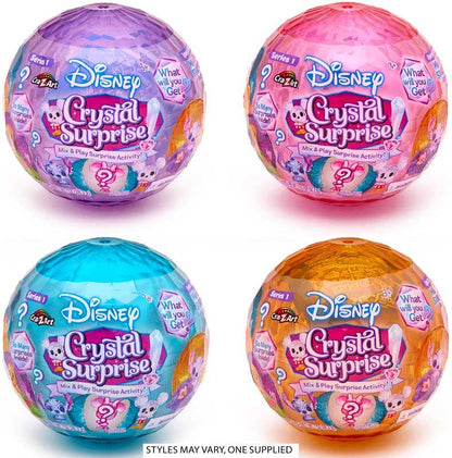 Four Disney Crystal Surprise toys in different colors on a white background