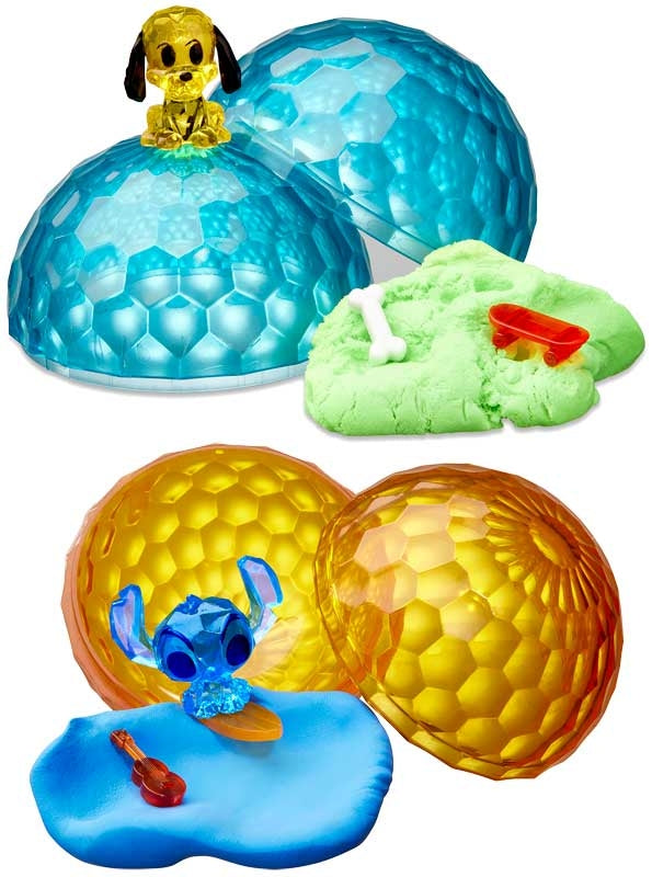 Toy set with blue, orange, and green translucent balls featuring cartoon characters on a white background.
