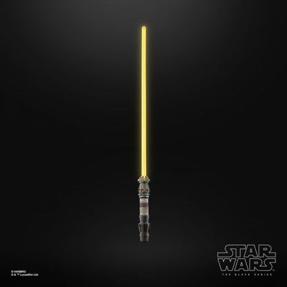 Light saber with a yellow blade on a black background, featuring the Star Wars logo.