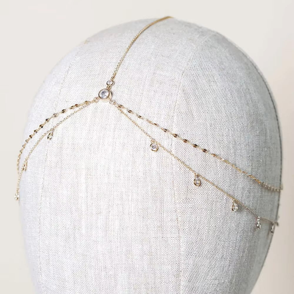 Amnesia Jewellery | Gold Coloured Headdress. Elevate your style with our gold plated stainless steel rhinestone headdress, designed to dazzle whether you're hitting the parties or walking down the aisle. Shop now for quality Jewellery/Jewelry!