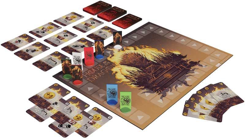 Board game setup with cards and pieces on a white background