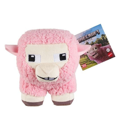 Pink plush toy resembling a sheep from Minecraft with a promotional card in the background.