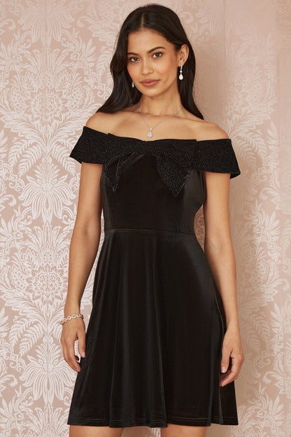 Black Velvet Skater Dress With Sparkle Bow Neckline