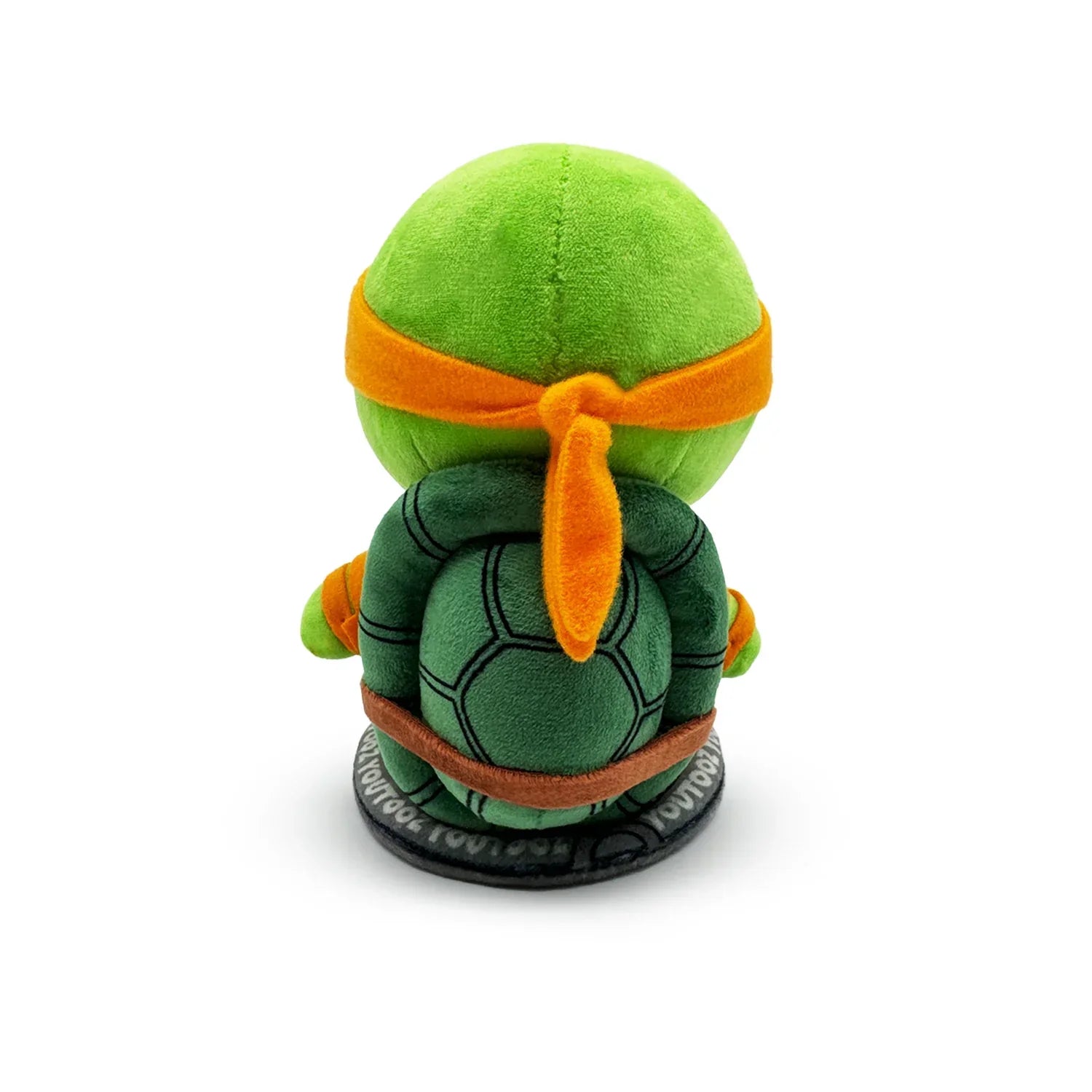 TMNT Green plush toy with orange bandana on a white background