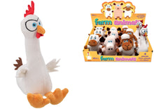 Plush toy chicken next to a box of farm animal plush toys