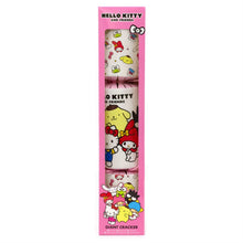 Packaged Hello Kitty and friends giant cracker with colorful characters on a pink background